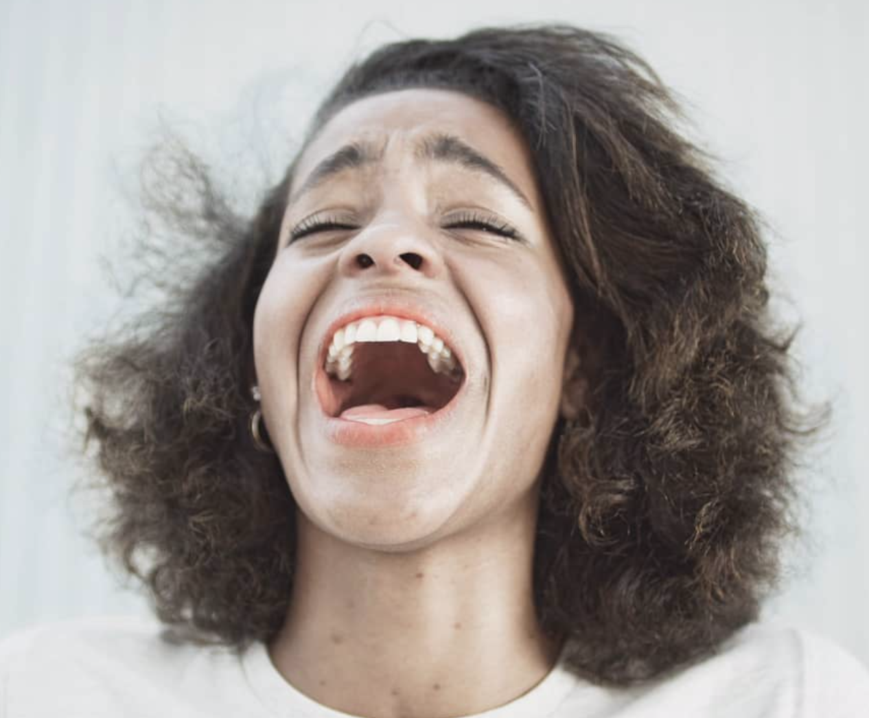 Fine art picture showing a laughing young woman