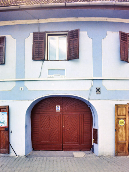 Fine art picture showing an old house watching the neighbourhood